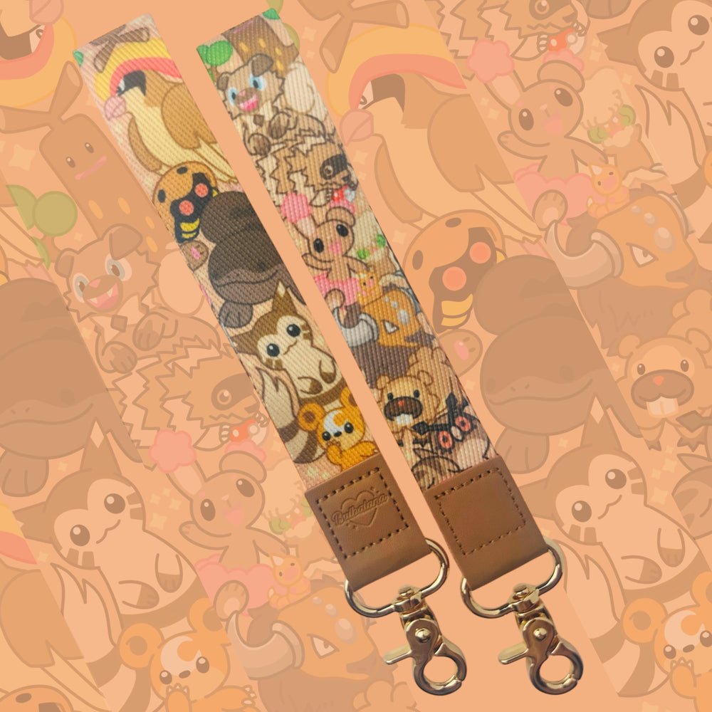 Brown Cute Monsters Double Sided Wristlet 6”
