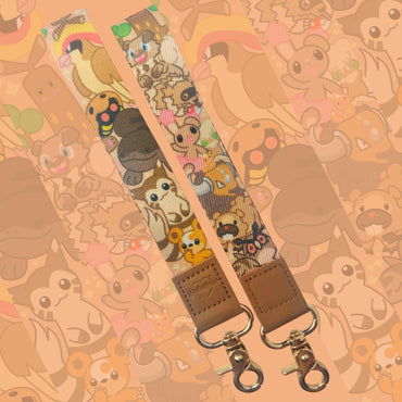 Brown Cute Monsters Double Sided Wristlet 6”